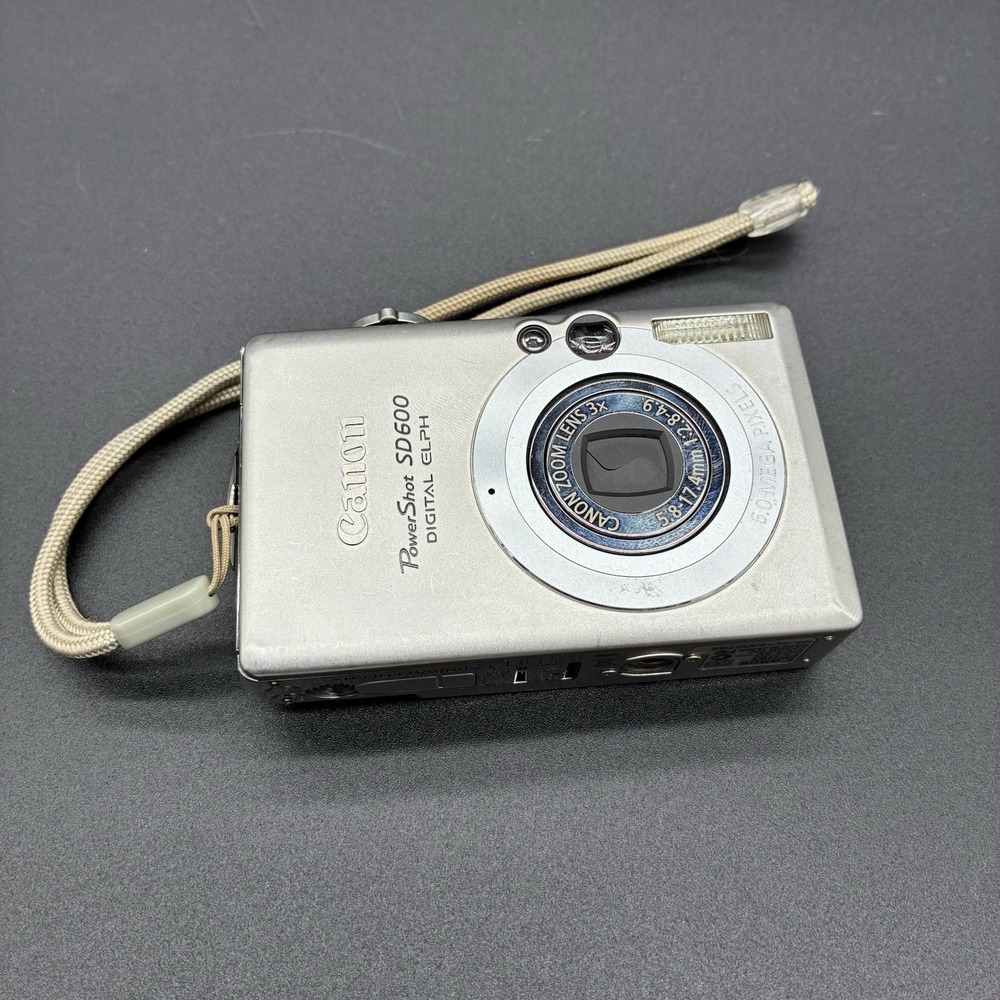 Canon PowerShot SD600 Digital ELPH 6MP Silver Camera Tested w/ Battery Case - Picture 2 of 8